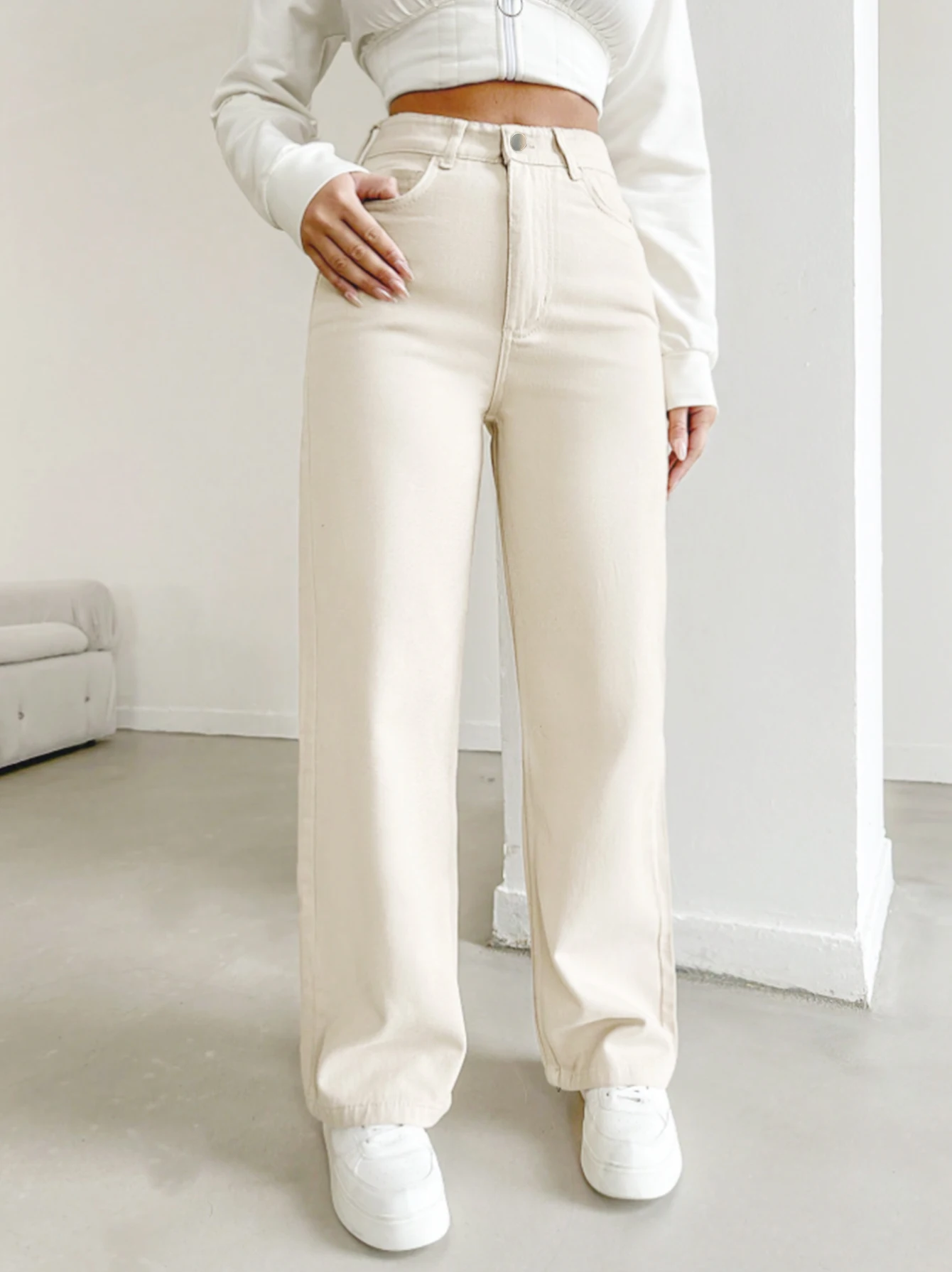 women's autumn jeans, made of cotton denim, in a beige apricot color, straight leg, slim fit, high waisted, elastic waistband women's autumn jeans, made of cotton denim, in a beige apricot color, straight leg, slim fit, high waisted, elastic waistband